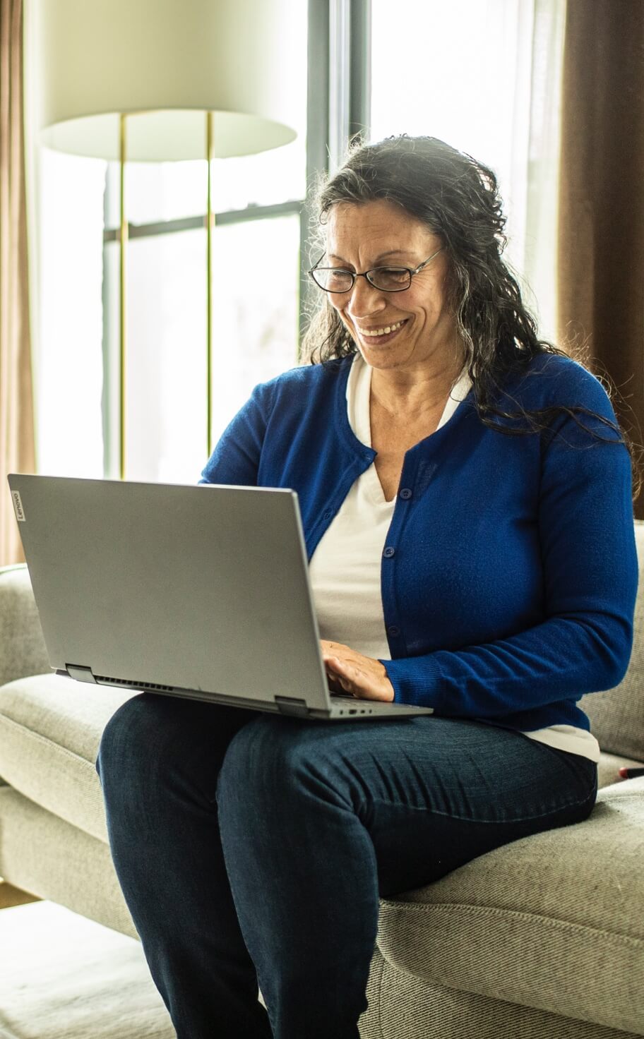 woman using laptop in home